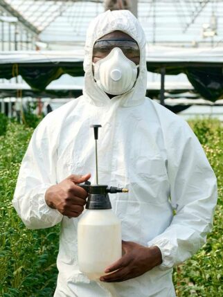 greenhouse-worker-wearing-protective-suit-p greenhouse-worker-wearing-protective-suit-p
